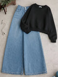 Black Sweatshirt & Wide-Leg Denim Jeans – Minimal Streetwear Combo